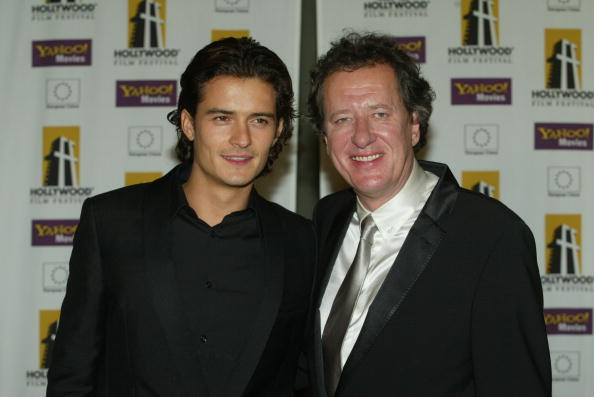 BEVERLY HILLS, CA - OCTOBER 20:  Actors Orlando Bloom(L) and Geoffrey Rush attend the Hollywood Awards Gala Ceremony at the Beverly Hilton Hotel, October 20, 2003 in Beverly Hills, California.  (Photo by Kevin Winter/Getty Images)