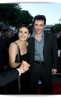 Cast members Catherine Zeta Jones and John Cusack arrive for the premiere of the movie, 'America's Sweethearts' at the Westwood Mann Bruin, Los Angeles, CA., Tuesday,  July 17, 2001.  (photo by Kevin Winter/Getty Images)